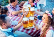 Oktoberfest Events in Southeast Michigan People enjoying food and drink in Bavarian beer garden