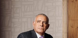 An academic leader, researcher, and roboticist, Tarek Sobh sports a Ralph Lauren suit coat with a Loro Piana button-up and a Versace tie. An Hermès belt holds up his Hugo Boss trousers — the cuff links are Ferragamo, as are the shoes.
