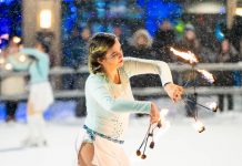 13 Winter Events and Activities Across Michigan to Check Out Figure skater performing with fire
