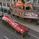 Detroit's Christmas tree traveling past the Fox Theatre on Woodward Ave.