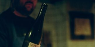 Pouring wine at Detroit's Bar Chenin, a 2026 James Beard nominee for best new bar
