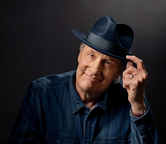 What’s Cooking? Metro Detroit Dining News for August 2026 Jeff Daniels posing for a portrait, while wearing a fedora.