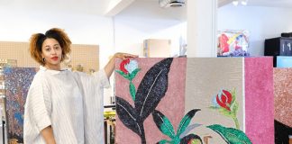 Akea Brionne posing with her piece 'A Dreaming Hour'