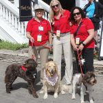 Handlers with Corewell Therapy Pups