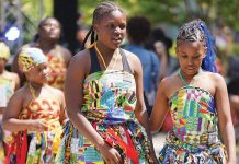 How to Celebrate Juneteenth 2026 in Metro Detroit Young girls in African print clothing celebrating Juneteenth