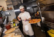 What’s Cooking? Metro Detroit Dining News for June 2026 Matt Arb holds a pizza at Amelia Street, which opened in June, major dining news in metro Detroit