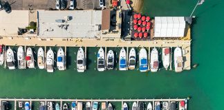 Aerial top down view of Motor city Marina, many boats docked at the shore in Wyandotte, Michigan