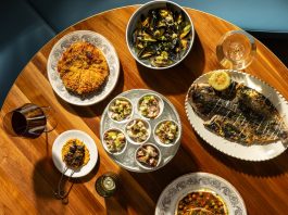 Hour Detroit’s Best New Restaurants 2026: Medusa in Detroit Bottom, clockwisefrom top right: sfincione, mussels bianco, branzino, pesce spada, insalata di mare, spiedini (lamb belly skewers).