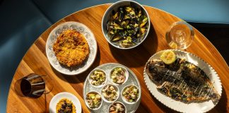 Bottom, clockwisefrom top right: sfincione, mussels bianco, branzino, pesce spada, insalata di mare, spiedini (lamb belly skewers).