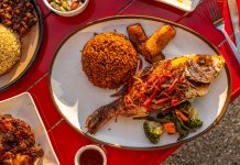 Hour Detroit’s Best New Restaurants 2026: Little Liberia in Detroit Fried fish with jollof rice, plantains, and roasted vegetables from Little Liberia