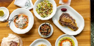 From top, clockwise house wedge salad, dry aged bone-in ribeye with zip sauce, fried burrata, dirty martini, dover sole au meunière, roasted mushrooms.