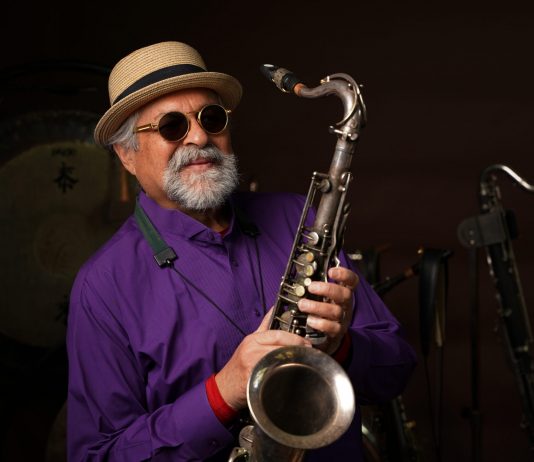Why the Detroit Jazz Festival Matters Now More Than Ever Joe Lovano posing with his saxophone.