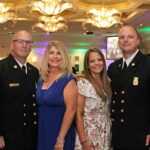 Deputy Fire Chief Kevin and Eairon Brown, Sarah and Station Chief Greg Scott