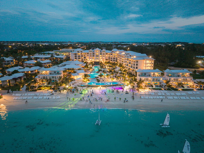default An aerial view of Treasure Beach Village during the golden-hour beach party.