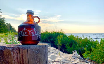 Bière de Mac Brew Works: A Beer-lover’s Paradise in Mackinaw City A howler from Bière de Mac on the beach