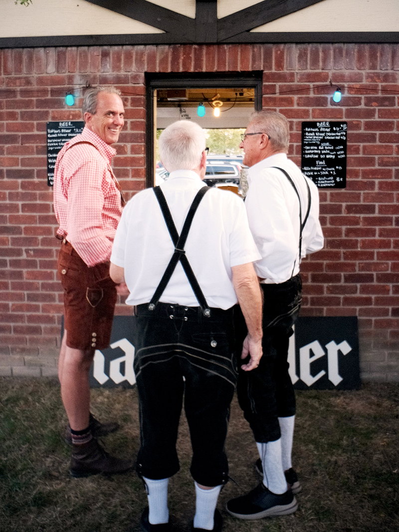 Men dressed in lederhosen at the Dakota Inn Rathskeller.