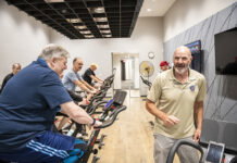The Successful Rookie Season of the Kirk Gibson Center for Parkinson’s Wellness Kirk Gibson himself takes classes at the center, his favorite being tai chi. He's shown here with members completing a spinning workout.