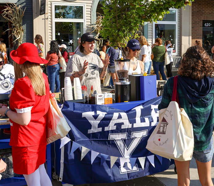 DSH2026-3 A small stand decorated in a Yale flag selling coffee at Destination Starz Hollow in Brighton, Mich.