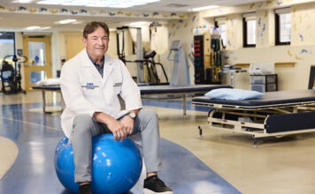 Pano Papalekas, M.D. sitting on a balance ball