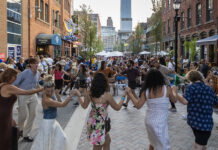 Greektown’s Monroe Streetscape Is Officially Complete People dancing in the Greektown Monroe Streetscape