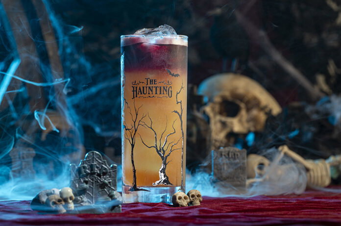 HAUNTING-2026_Collins_Severed-Sun_MHom_3264 copy A spooky Halloween cocktail near spider webs and skulls