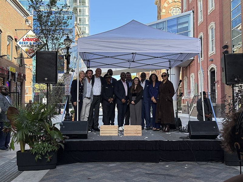 Government and community leaders gather on Oct. 14 to celebrate the completion of the Greektown Monroe Streetscape