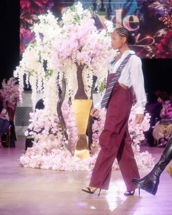 The Style Guru: overalls with striped ties with big buckles serving as anything-but-ordinary straps.