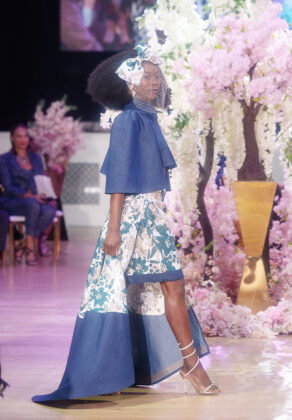 Caldonia&rsquo;s Box: Cropped denim cape with puffed shoulders paired with a knee-length floral skirt with denim trim and matching train.